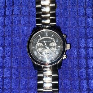 Black and silver metal band MK watch